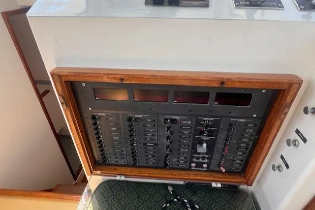 Miss Nina Yacht Photos Pics Control panel of a 1996 Custom Bolger PH Shoal-draft Ketch with wooden frame.