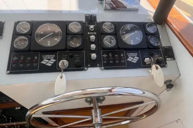 Miss Nina Yacht Photos Pics Control panel of 1996 Custom Bolger PH Shoal-draft Ketch with Cummins Marine gauges.