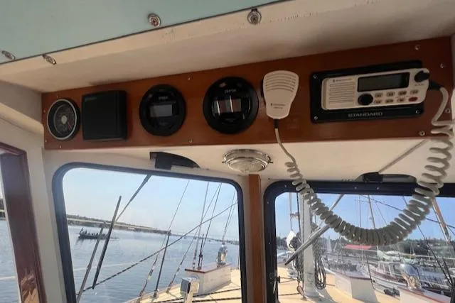 Miss Nina Yacht Photos Pics Interior view of 1996 Custom Bolger PH Shoal-draft Ketch with navigation instruments.