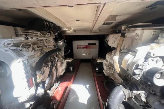 Miss Nina Yacht Photos Pics Engine room of a 1996 Custom Bolger PH Shoal-draft Ketch, showcasing dual engines.