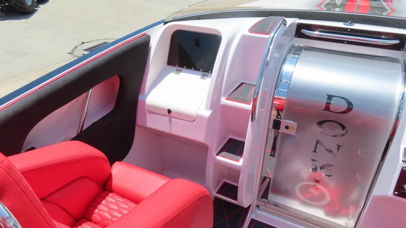  Yacht Photos Pics 2009 Donzi 35ZR boat interior with red seating and sleek design elements.