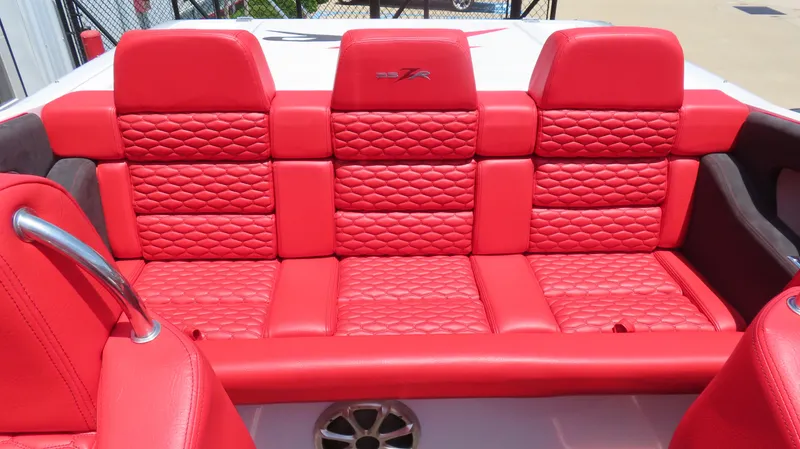  Yacht Photos Pics Red leather seating in a 2009 Donzi 35ZR boat, featuring quilted design and sleek finish.