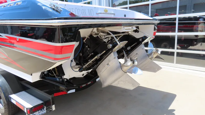  Yacht Photos Pics 2009 Donzi 35ZR boat with dual propellers, parked on a trailer.