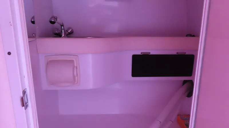  Yacht Photos Pics 2009 Donzi 35ZR boat interior bathroom with sink and toilet paper holder.