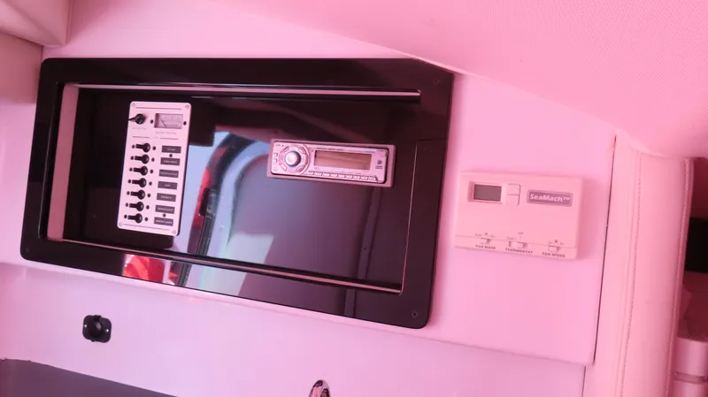  Yacht Photos Pics Control panel and thermostat inside a 2009 Donzi 35ZR boat cabin.