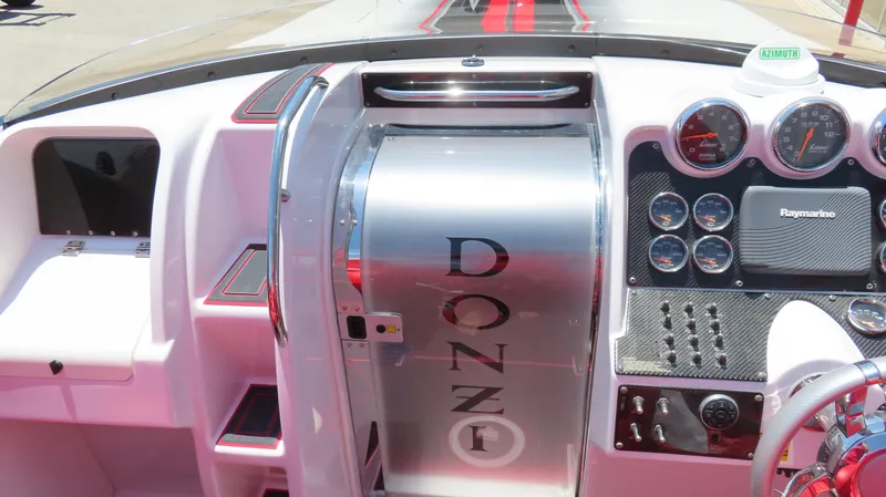  Yacht Photos Pics 2009 Donzi 35ZR boat dashboard with gauges and Raymarine equipment.
