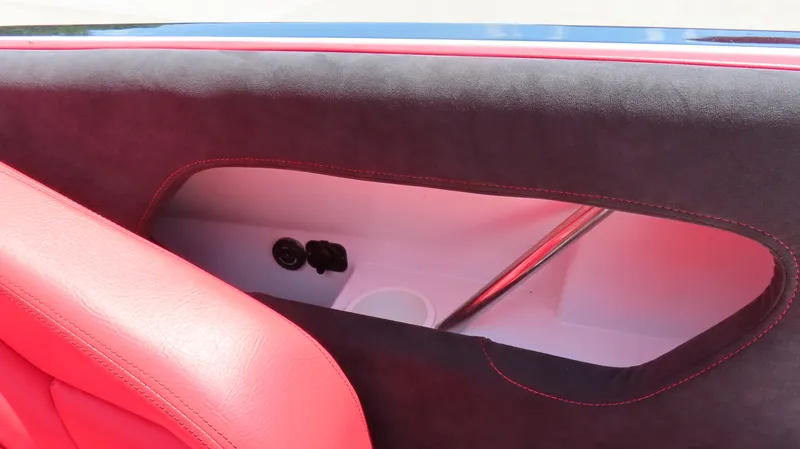  Yacht Photos Pics Interior detail of a 2009 Donzi 35ZR boat with red and black upholstery.