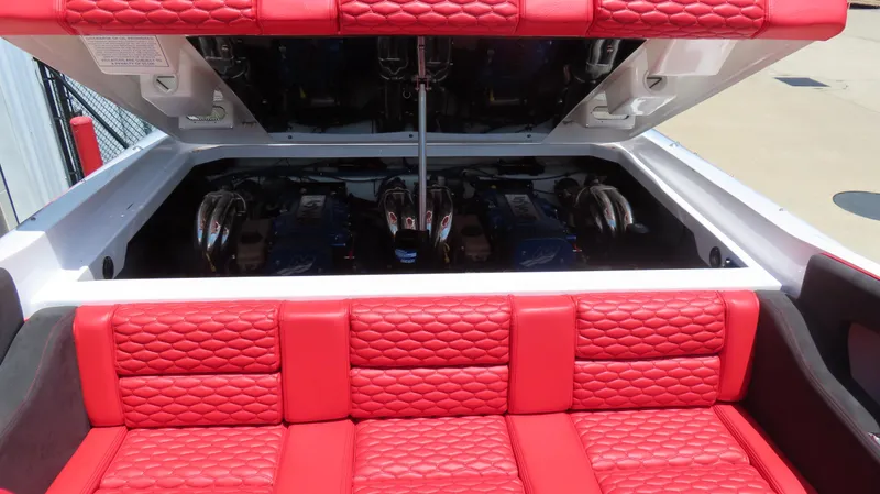  Yacht Photos Pics 2009 Donzi 35ZR boat with red quilted seats and open engine compartment.