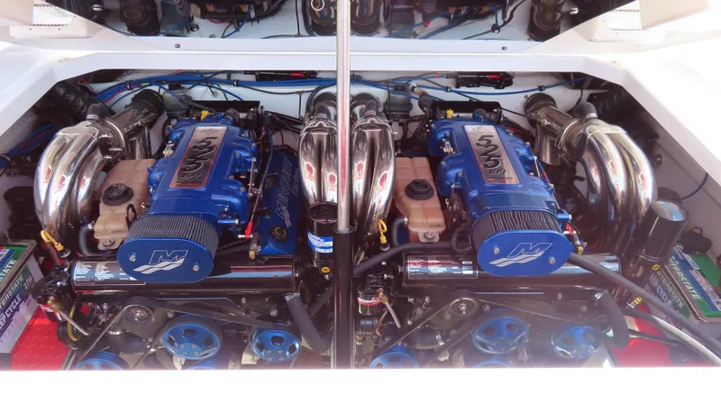  Yacht Photos Pics 2009 Donzi 35ZR engine compartment with dual Mercury engines, showcasing performance and power.