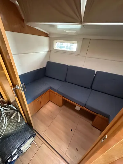 La Vieja Yacht Photos Pics Interior of 2011 Beneteau Sense 50 yacht with cozy seating area and wooden finishes.