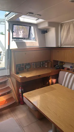 La Vieja Yacht Photos Pics Interior of 2011 Beneteau Sense 50 yacht with wooden furnishings and natural light.