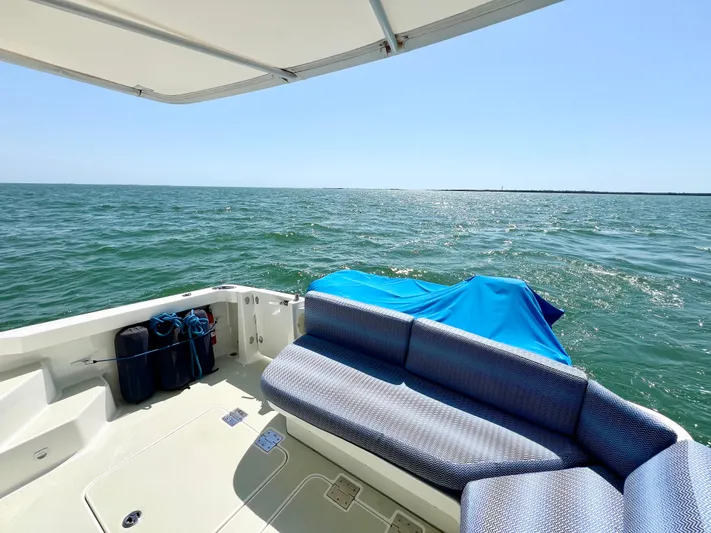 Traveller Yacht Photos Pics Back Cove 34 boat deck, 2016 model, with ocean view and seating area.