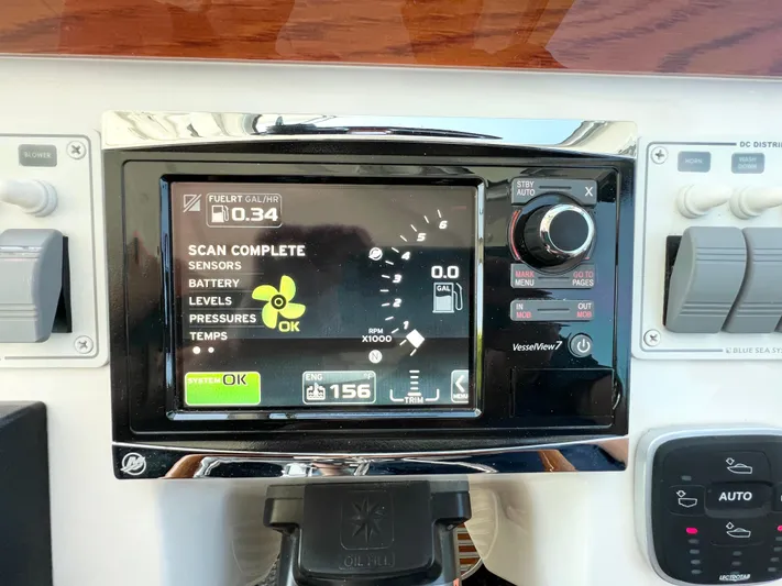 Traveller Yacht Photos Pics Control panel of a 2016 Back Cove 34 boat displaying engine and sensor data.