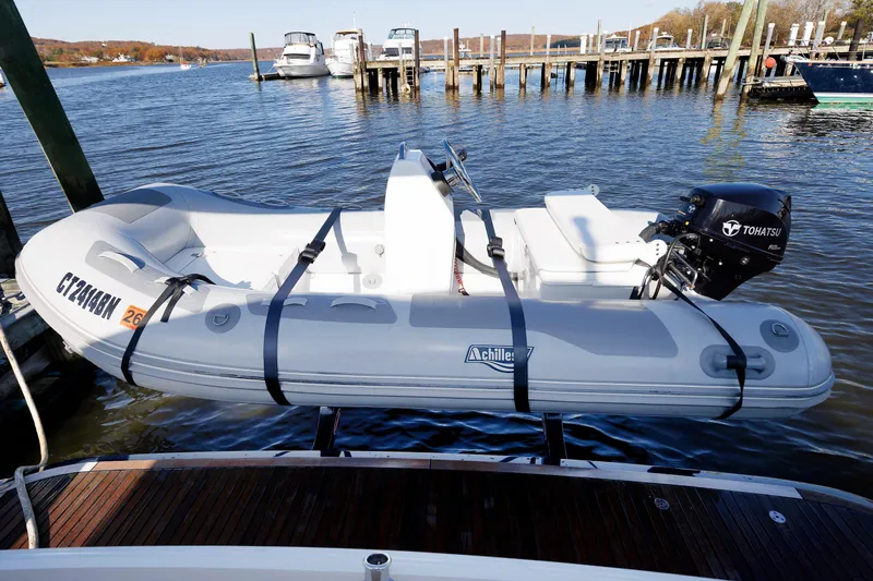 Friendly Persuasion Yacht Photos Pics Inflatable boat with Tohatsu motor docked near Grand Banks 44 Eastbay SX, 2019 model.