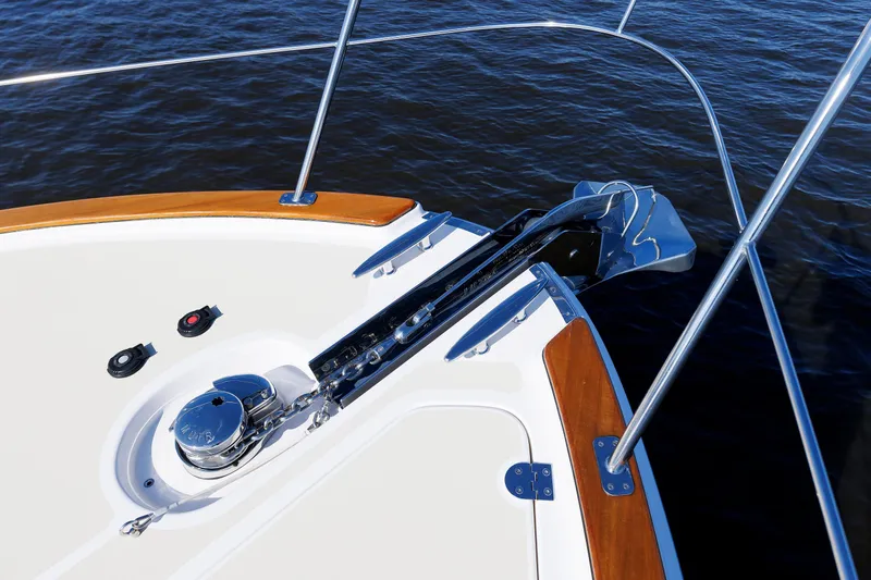 Friendly Persuasion Yacht Photos Pics Bow of 2019 Grand Banks 44 Eastbay SX yacht with anchor and railing.