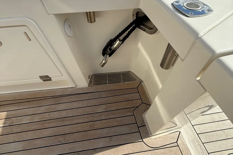 Yacht Photos Pics 2023 Maritimo M600 yacht deck with wood finish and stainless steel fittings.