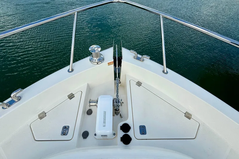  Yacht Photos Pics Bow of 2023 Maritimo M600 yacht with anchor and storage compartments.