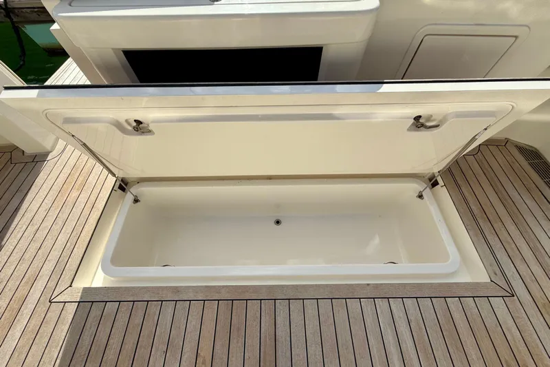  Yacht Photos Pics Open storage compartment on 2023 Maritimo M600 yacht deck.