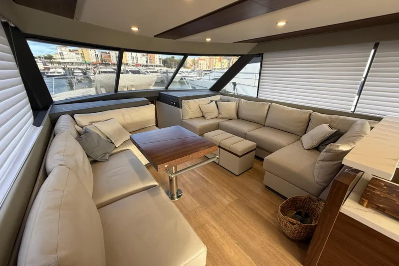  Yacht Photos Pics Luxurious interior of 2023 Maritimo M600 yacht with spacious seating and elegant design.