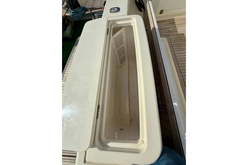  Yacht Photos Pics Open storage compartment on 2023 Maritimo M600 yacht deck.