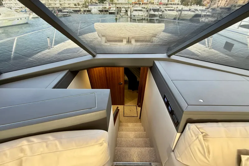  Yacht Photos Pics Interior view of 2023 Maritimo M600 yacht, showcasing stairs and luxurious design.