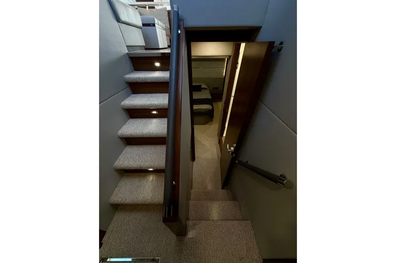  Yacht Photos Pics Staircase leading to cabin in 2023 Maritimo M600 yacht interior.