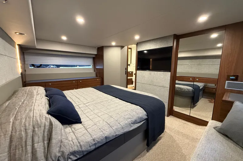  Yacht Photos Pics Luxurious bedroom interior of 2023 Maritimo M600 yacht with modern design and elegant furnishings.