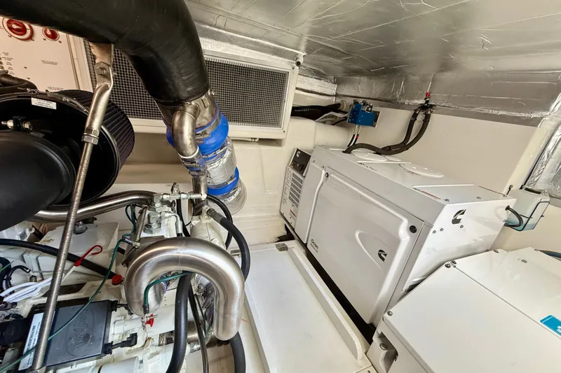  Yacht Photos Pics Engine room of 2023 Maritimo M600 yacht with mechanical components and equipment.