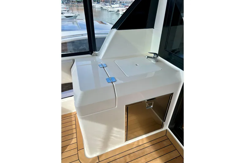  Yacht Photos Pics 2023 Maritimo M600 yacht interior with sleek sink and storage, featuring modern design.