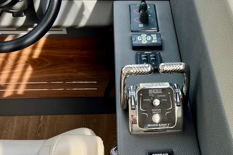  Yacht Photos Pics 2023 Maritimo M600 yacht control panel with steering wheel and throttle levers.