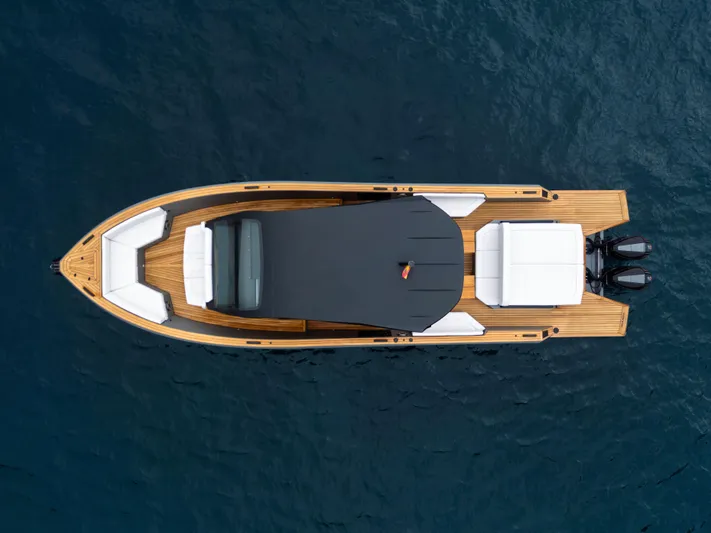 Maxim Yachts | Max43 Race Yacht Photos Pics Aerial view of 2025 Maxim Yachts 43 on calm blue water.
