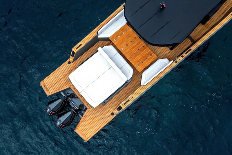 Maxim Yachts | Max43 Race Yacht Photos Pics Aerial view of 2025 Maxim Yachts 43, featuring sleek design and dual outboard motors.