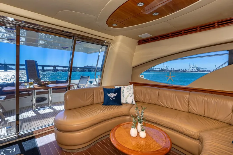 L’chaim Yacht Photos Pics Luxurious interior of 2007 Azimut Fly 62 yacht with ocean view and leather seating.