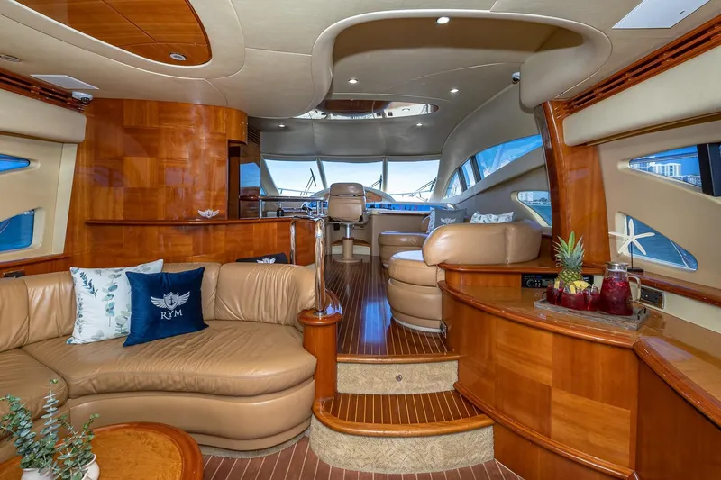 L’chaim Yacht Photos Pics Luxurious interior of 2007 Azimut Fly 62 yacht with elegant wood and leather furnishings.