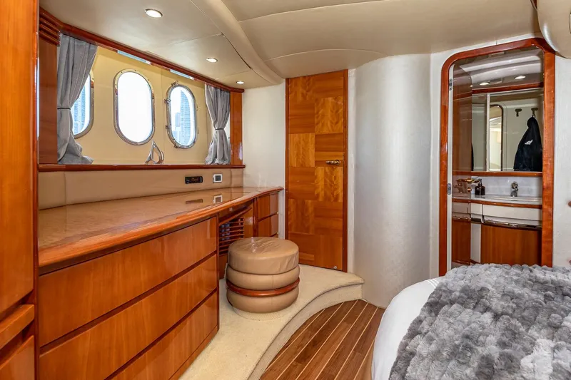 L’chaim Yacht Photos Pics Luxurious interior of 2007 Azimut Fly 62 yacht with elegant wood finishes.