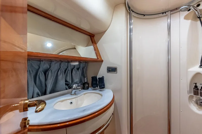 L’chaim Yacht Photos Pics Luxurious bathroom interior of 2007 Azimut Fly 62 yacht with elegant fixtures.