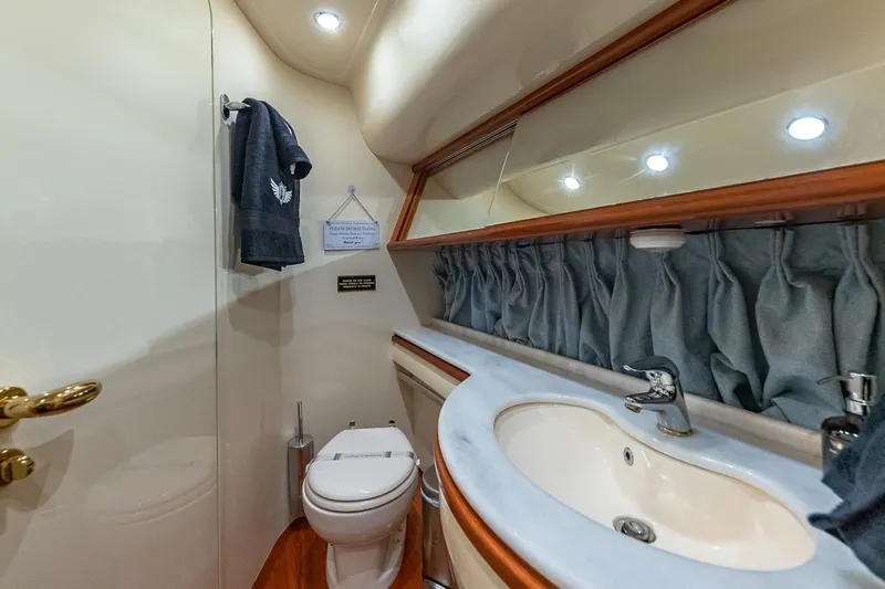L’chaim Yacht Photos Pics Luxurious bathroom in 2007 Azimut Fly 62 yacht with elegant fixtures and lighting.