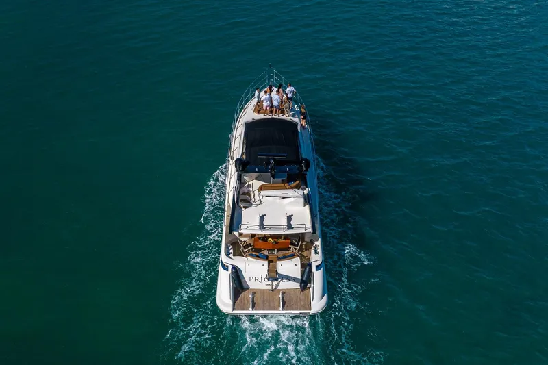 L’chaim Yacht Photos Pics Aerial view of 2007 Azimut Fly 62 yacht cruising on open water.