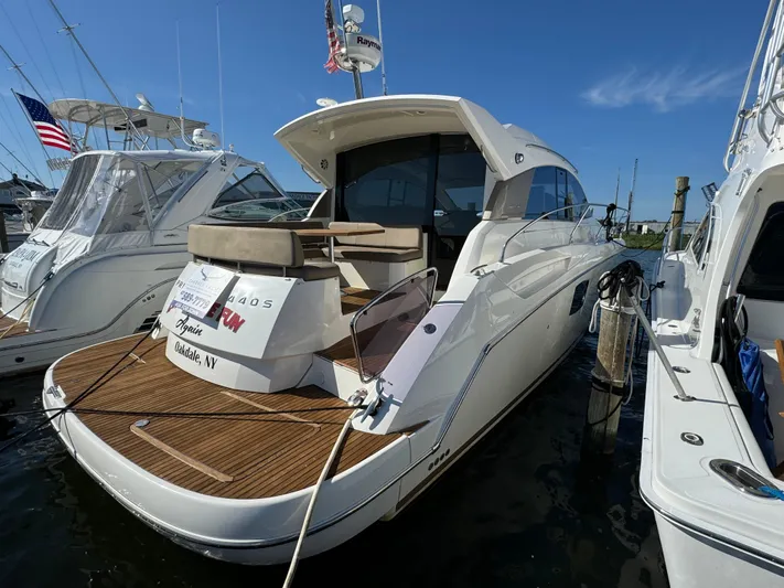  Yacht Photos Pics 2012 Prestige 440 S yacht docked at marina, featuring sleek design and spacious deck.