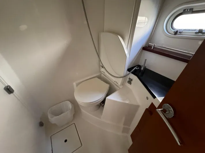  Yacht Photos Pics Compact bathroom in 2012 Prestige 440 S yacht with toilet and sink.