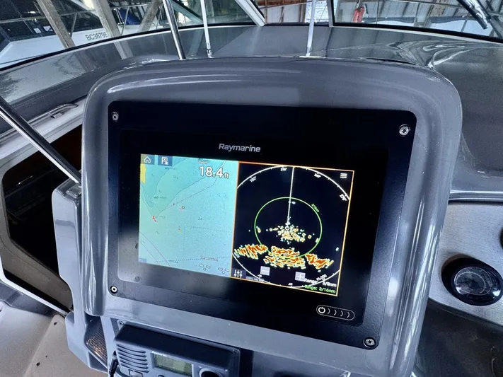  Yacht Photos Pics Raymarine navigation system on 2006 Cruisers Yachts 340 Express dashboard.