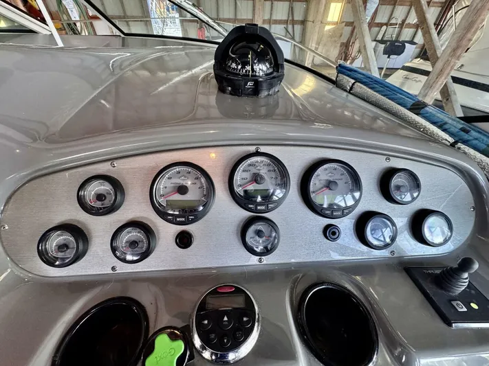  Yacht Photos Pics Dashboard of 2006 Cruisers Yachts 340 Express with gauges and compass.