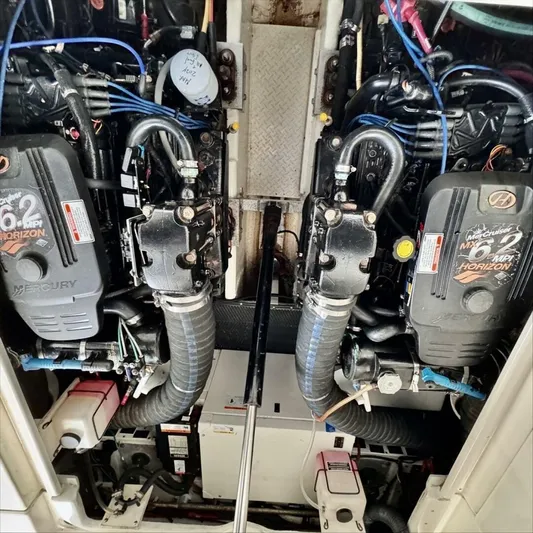  Yacht Photos Pics Engine compartment of a 2006 Cruisers Yachts 340 Express with twin Mercury 6.2L engines.