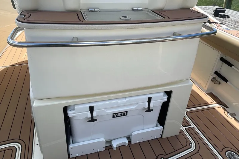 Yacht Photos Pics 2015 Scout 300 LXF boat with Yeti cooler on teak deck.