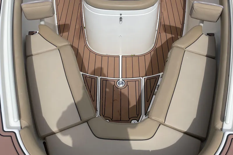  Yacht Photos Pics 2015 Scout 300 LXF boat interior with tan seating and teak flooring.