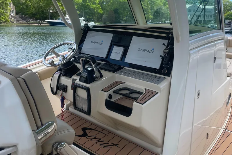  Yacht Photos Pics 2015 Scout 300 LXF boat cockpit with Garmin navigation displays.