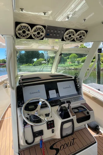 Yacht Photos Pics 2015 Scout 300 LXF boat helm with Garmin displays and audio system.