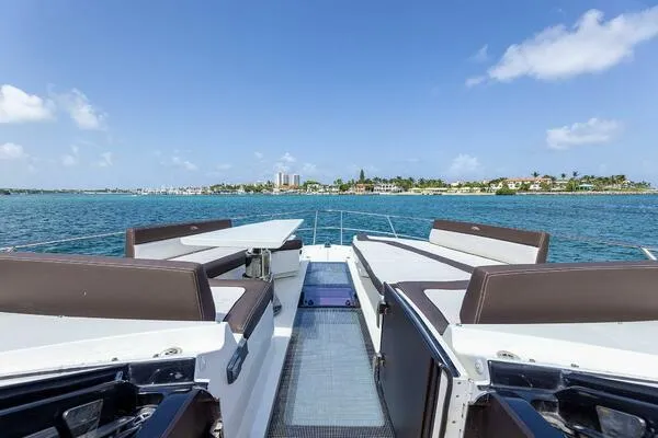  Yacht Photos Pics Luxurious 2019 Galeon 640 Fly yacht deck with ocean view and clear blue sky.