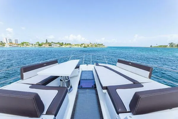  Yacht Photos Pics Luxurious 2019 Galeon 640 Fly yacht deck with ocean view and seating area.