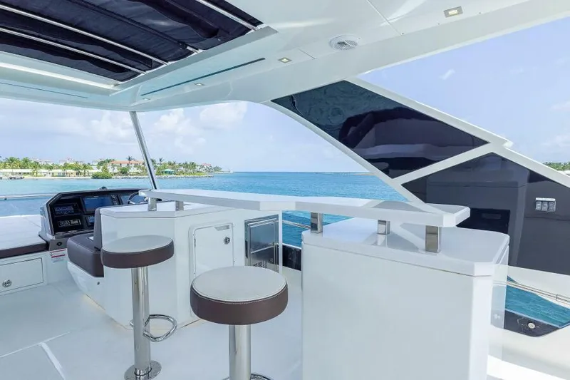  Yacht Photos Pics Luxurious 2019 Galeon 640 Fly yacht interior with ocean view and modern seating.
